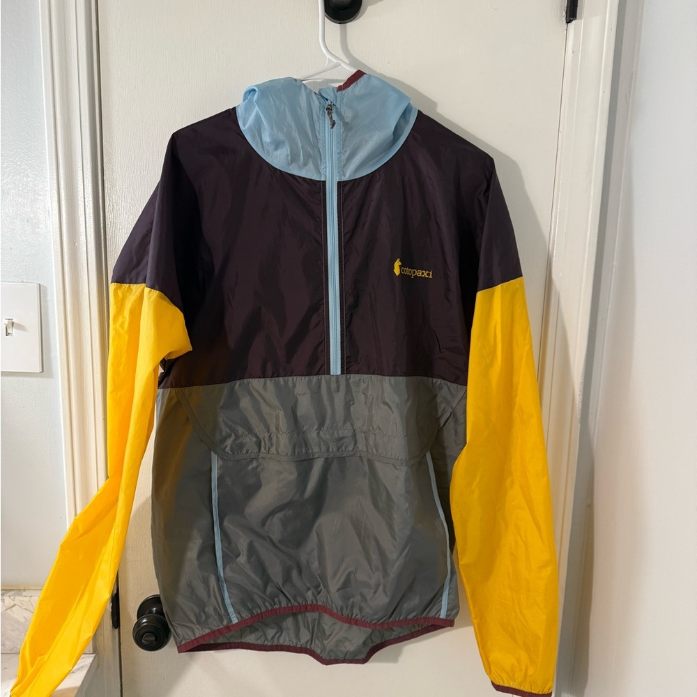 cotopaxi Colorblock Windbreaker Jacket in Yellow, Light Blue, Gray, Dark Purple